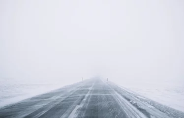 Crédence de cuisine en verre imprimé Hiver Winter Blizzard in the driving road in Iceland