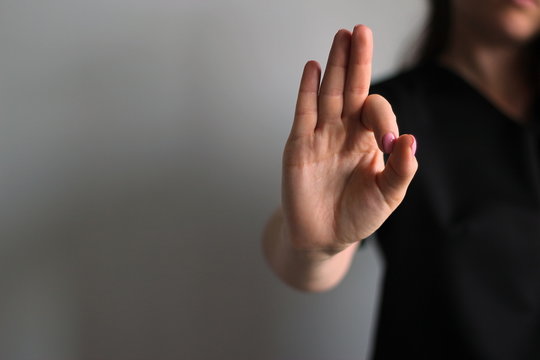 Young woman's hands shows ok. Gesture