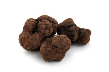 Black truffles on white.