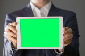 Businessman's  hands holding tablet 