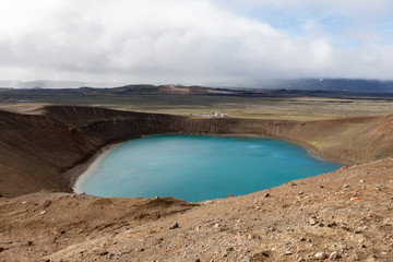 Viti crater, Krafla volcanic area, Myvatn, Northern Iceland. Bright blue waters of the lake inside...