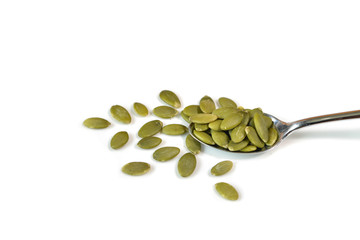 Pumpkin seeds on white background - isolated