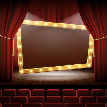 Banner with light bulbs on the stage of the cinema.