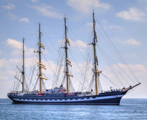 Fototapeta na wymiar Sailing ship in the blue sea