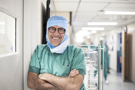 Portrait of surgeon in hospital corridor
