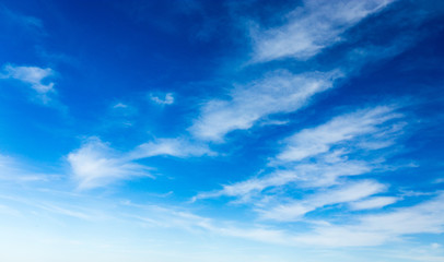 Naklejka na ściany i meble Clouds against blue sky as background