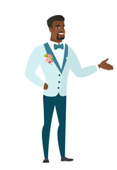 Groom with arm out in a welcoming gesture.