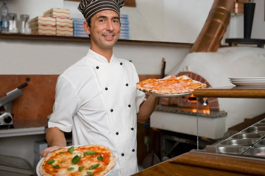 People in a pizzaria