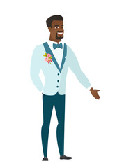 African-american groom with hand in his pocket.
