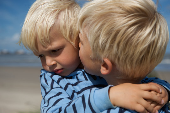 Big brother consoling the little one