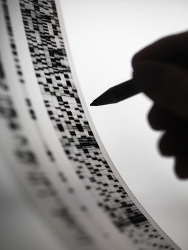 Scientist marking up DNA autoradiogram