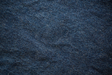 Fototapeta na wymiar The blue wrinkled jean as a background.