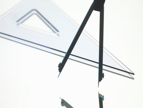 Close up of protractor and set square