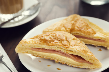 Savory Ham and Cheese Sandwich Pastry in European Cafe