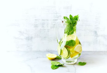 Fototapeten Lime, lemon  and mint infused water in a jug © B.G. Photography