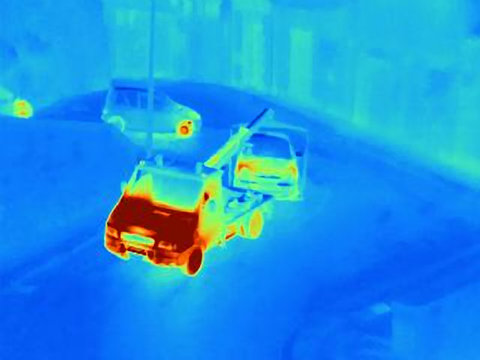 Thermal image of tow truck at work