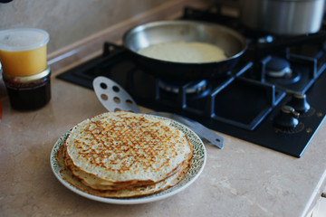  Preparation of homemade pancakes on a gas stove