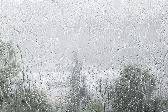 Rain drops on window. The beautiful background.