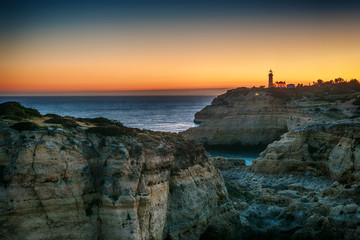 Fototapeta na wymiar Portugal: beautiful rocks in the coast of Algarve at sunset 
