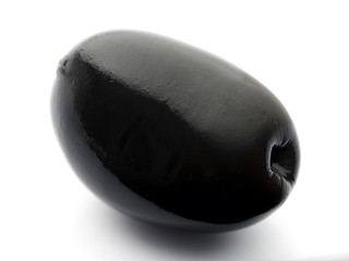 Black olive close up isolated on white background.  