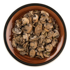 Heap of fried mushrooms in plate isolated on white background.