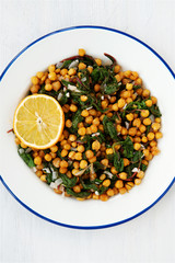 Warm salad with roasted swiss chard leaves and baked chickpeas 
