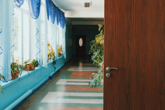 Corridor with open door in the school
