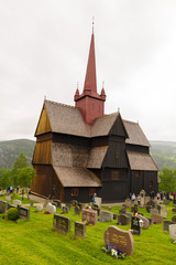 Fototapeta na wymiar The stave church at Ringebu, built around the year 1220, is one of fewer than 30 surviving stave churches and is one of the largest.
