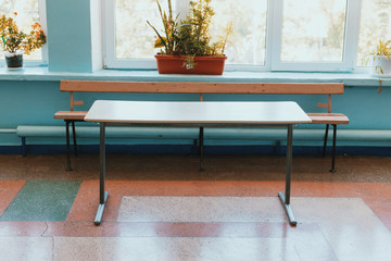 School desk in the corridor