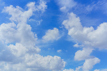 Obraz na płótnie Canvas Beautiful white clouds and blue sky background