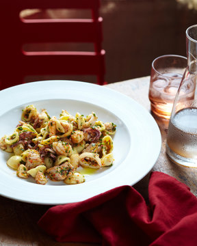 Seafood orecchiette in white bowl