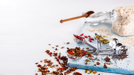 Granola,Oatmeal,Muesli on a White Background.Breakfast.Vegetarian.Food or Healthy diet concept.Copy space for Text. selective focus.