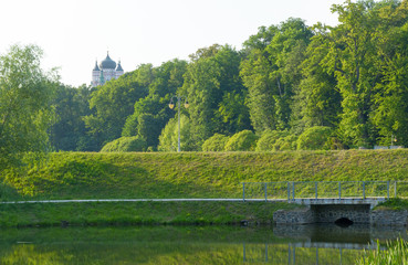 Lake bled church in summer with sky and reflection on the lake