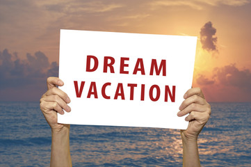 Dream Vacation card with a sea on background
