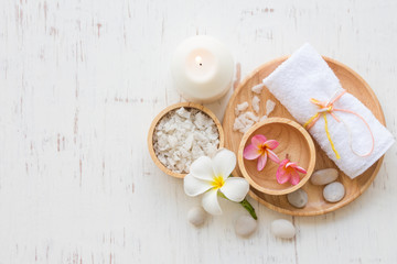 Beauty and fashion concept with spa set on white rustic wooden background