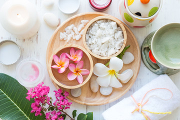 Beauty and fashion concept with spa set on white rustic wooden background