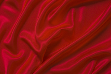 An abstract backdrop or liquid wave or folded notches of silk, grunge, satin, Christmas background.