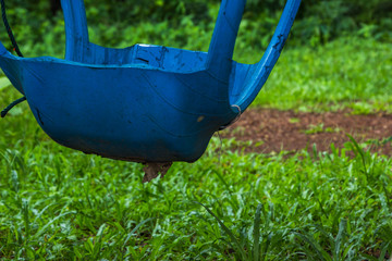 Swings made of tires, trees