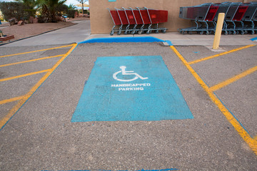 Handicapped parking spot - transportation road markings.