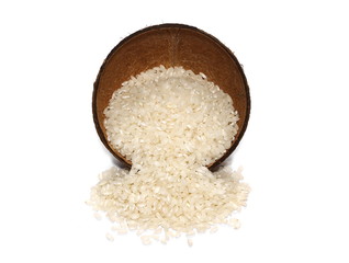 White rice pile in coconut shell, bowl, isolated on white background