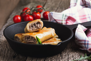 Minced meat rolled crepes