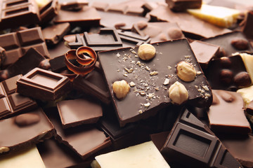 Heap of broken chocolate pieces, close up