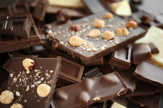 Heap of broken chocolate pieces, close up