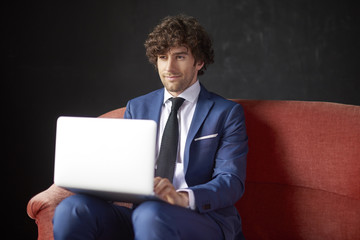 Exexutive young professional man with laptop