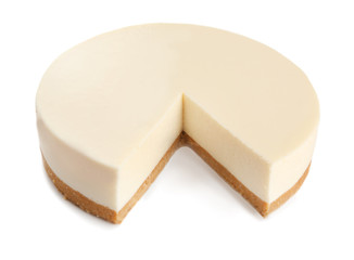 Delicious sliced cheesecake on white background