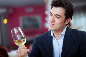 Man tasting wine