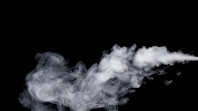 Smoke steam on black background in slow motion.
