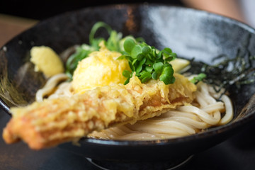 Hot udon with fired egg shrimp and lemon