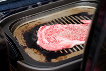 steak on grill