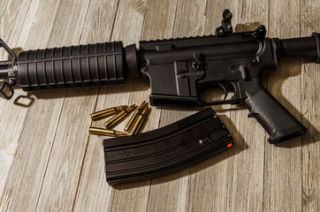 AR-15 styled rifle on a wooden table